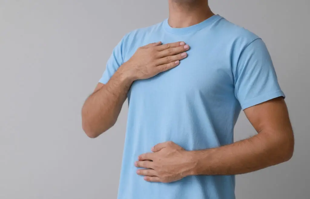 deep diaphragmatic breathing exercise performed by man