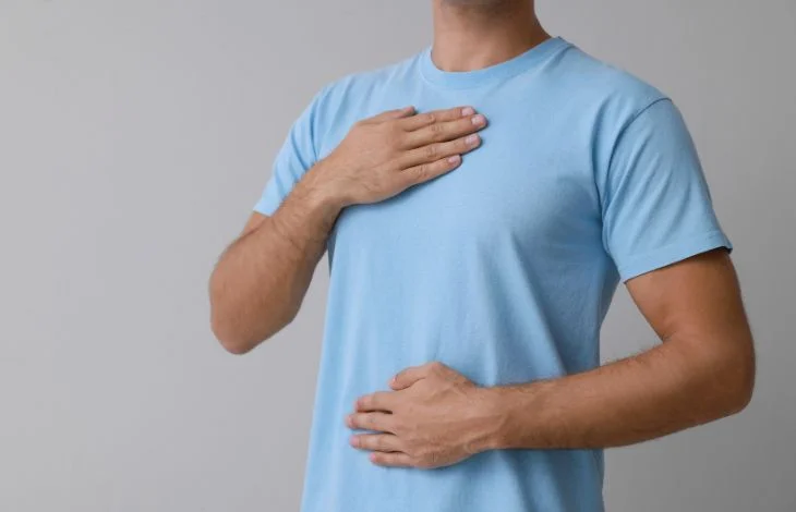 Man doing diaphragmatic breathing technique