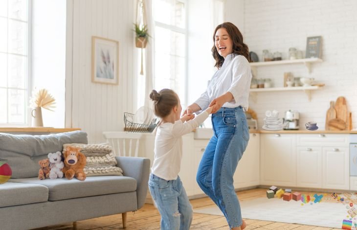 Mother and daughter dancing