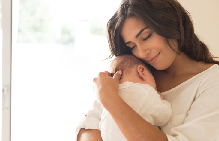 mother holding infant at witching hour